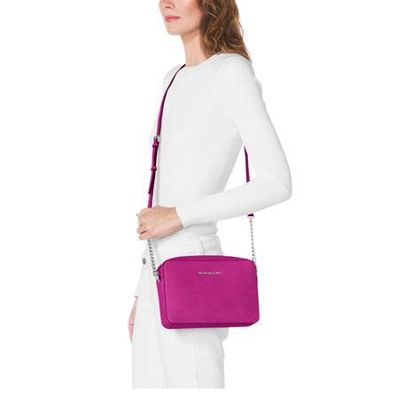 michael kors jet set crossbody fuschia|michael kors jet set collection.